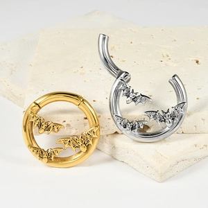 Fashionable stainless steel bat earring set in gold and silver finish on stones