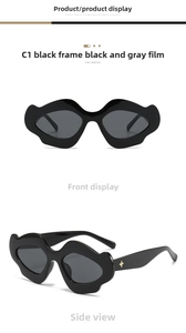 Irregular wavy black frames with gold star detail on temple and dark grey lenses