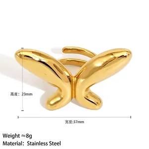 Golden stainless steel butterfly open ring with 3D streamlined design and dimensions