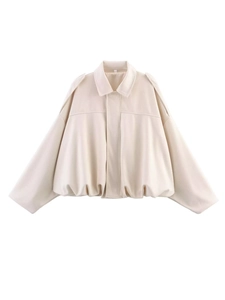 Detailed view of the lapel and drawstring hem on a cream oversized wool blend jacket