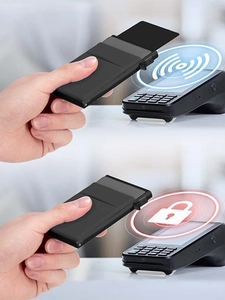 Detail showing RFID blocking technology for metal wallet with NFC protection demonstration