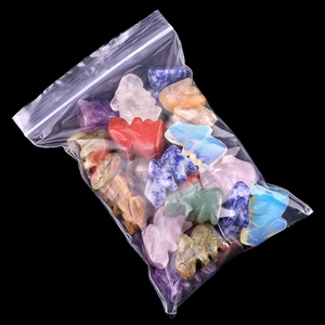 Mixed natural crystal agate rabbit figurines set in a transparent pouch