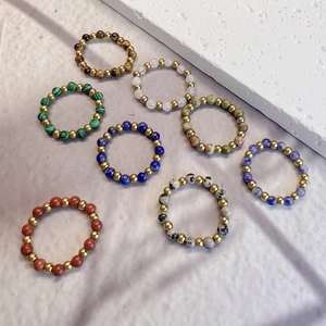 Elastic natural stone beaded rings set in assorted colors with gold stainless steel beads