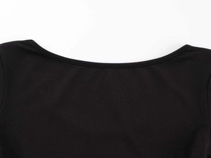 Detailed close-up of the black ribbed knit U-neckline on a slim-fit bodysuit