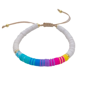 Bohemian colorful hand-woven beaded bracelet featuring rainbow clay discs and adjustable cord