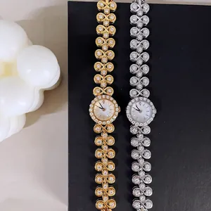 Luxury vintage quartz watches in gold and silver with diamond-set infinity link bands
