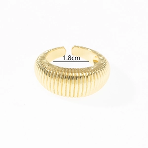 Detail showing an adjustable gold plated ring with vertical ridges and 1.8cm diameter