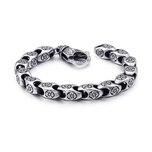 Vintage stainless steel punk bracelet featuring hollowed-out flower cross patterns