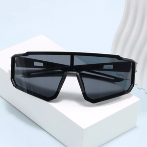 Oversized sports sunglasses with matte black frame and integrated dark gray shield lens