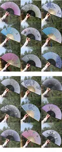 Matrix display of 18 vintage bamboo silk folding fans with floral patterns and silk tassels