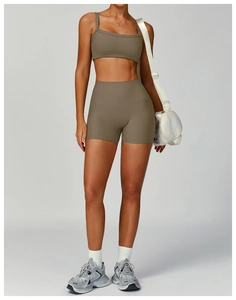 Close-up of ribbed texture high-waist fitness shorts and matching crop top yoga set