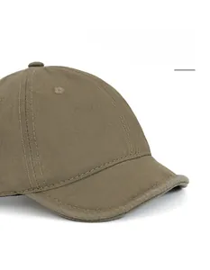 Close-up of herringbone cotton fabric and foldable short brim on vintage baseball cap