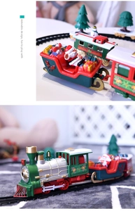 Detail of vintage Christmas electric train set with Santa Claus sleigh on a black track