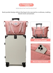Pink travel bag detail showing the luggage trolley sleeve and back anti-theft zipper pocket