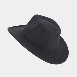 Close-up of black wool felt fedora showing smooth material texture and wide brim