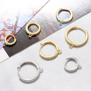 Sparkling cubic zirconia huggie hoops with hanging rings in gold and silver finishes