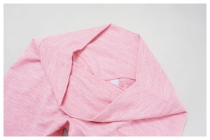 Detail of high-waisted wide waistband on pink snowflake pattern yoga leggings