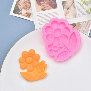 Pink silicone mold with flower and leaf design for DIY aromatherapy gypsum and fondant