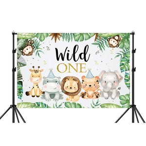 Jungle themed 'Wild ONE' birthday backdrop with cartoon animals on a black metal stand