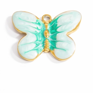 Macro detail of 18K gold stainless steel butterfly pendant with marble enamel inlay