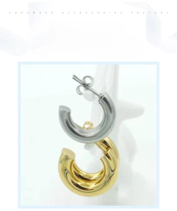 Detail view of 5.0mm thick C-shaped round wire hoop earrings in gold and silver finish