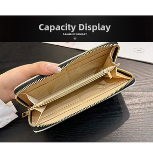 Detailed interior of long zipper wallet showing card slots and large capacity design