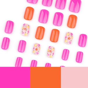 Short square press-on nails with pink, orange, and delicate floral pattern designs