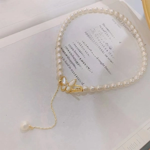 Elegant freshwater pearl necklace with zircon butterfly pendant and T-bar toggle clasp