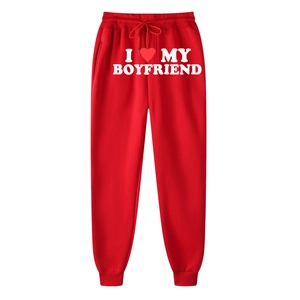 Red joggers with I Love My Boyfriend print, elastic waist and cuffed sport sweatpants
