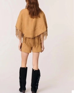 Detail shot of brown suede cape back view with elegant long fringes and matching shorts