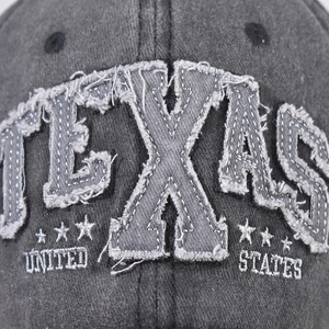Distressed dark grey washed cotton baseball cap with vintage TEXAS patchwork embroidery