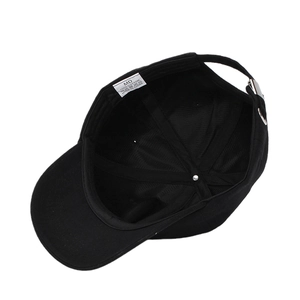 Internal view of black cotton baseball cap showing stitching, sweatband and inner tags