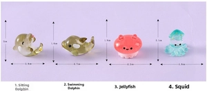 Detailed set of 4 translucent resin sea animal figurines including dolphin and jellyfish