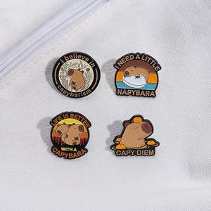 Cute capybara enamel pins set with fun slogans on white canvas background