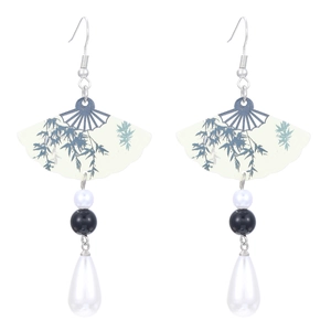 Macro detail of Chinese style fan earrings with bamboo pattern and drop pearl beads
