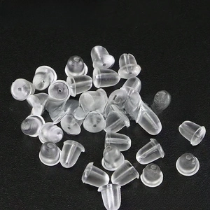 Macro shot of 4x5mm clear silicone earring backs for jewelry making and earring security