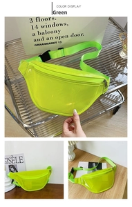 Detail of neon green transparent PVC belt bag with adjustable strap and zipper closure