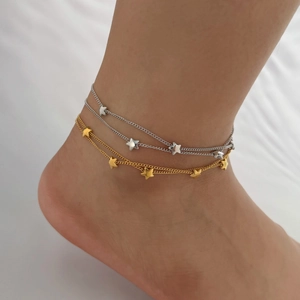 Double-layered stainless steel anklet set featuring delicate star charms in gold and silver