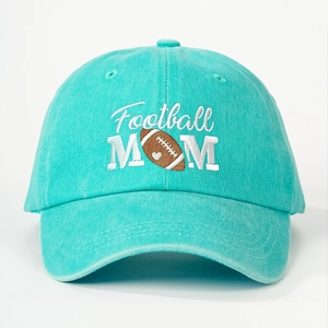 Close-up of Football MOM embroidery on turquoise washed cotton twill baseball cap