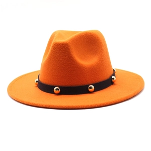 Detailed view of bright orange wool felt fedora featuring a gold studded black ribbon band