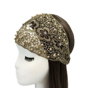 Elegant wide lace headband in bronze gold with pearls and sparkling rhinestones