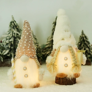 Gnomi di Natale in peluche luminosi con bastoncini di zucchero e calda luce LED