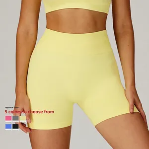 Short de yoga sans couture taille haute pour femmes en jaune vif pour le fitness