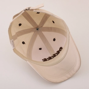 Kids baseball cap in beige cotton twill with interior stitching and embroidery detail