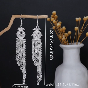 Detailed view of silver bohemian tassel earrings with dimensions and weight info