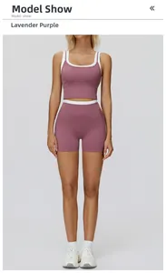 Detail of high-waist purple yoga shorts with white contrast trim and ribbed texture