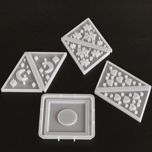 DIY silicone molds for resin casting featuring snowflake, moon, and heart relief patterns