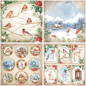 Detail of vintage Christmas scrapbook paper featuring watercolor reindeer and bird motifs