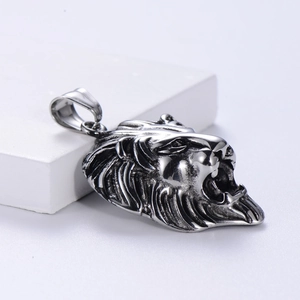 Retro lion head pendant in stainless steel with textured finish on a white stand