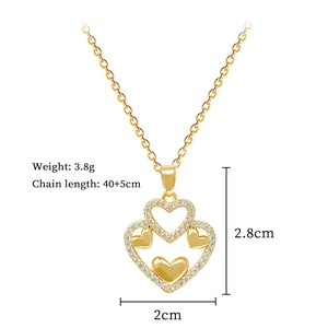 Detailed view of a layered heart pendant necklace with rhinestones and size parameters